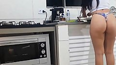 Organizing the kitchen in underwear