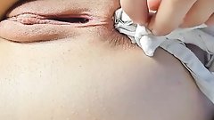 pretty woman inserts panties in the ass